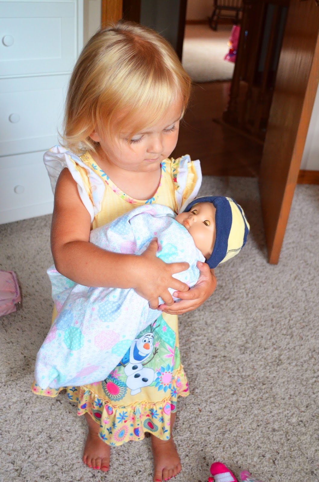 bitty baby string on neck