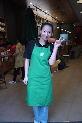 young lady who works at Starbucks