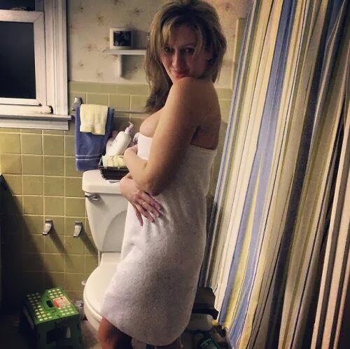 Nude woman towel