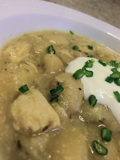 White chicken chili with cannellini beans sour cream and cumin