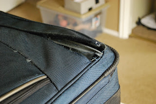 A picture of the torn suitcase