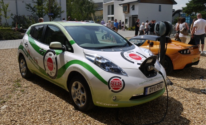 Nissan Leaf and Tesla Roadster recharging