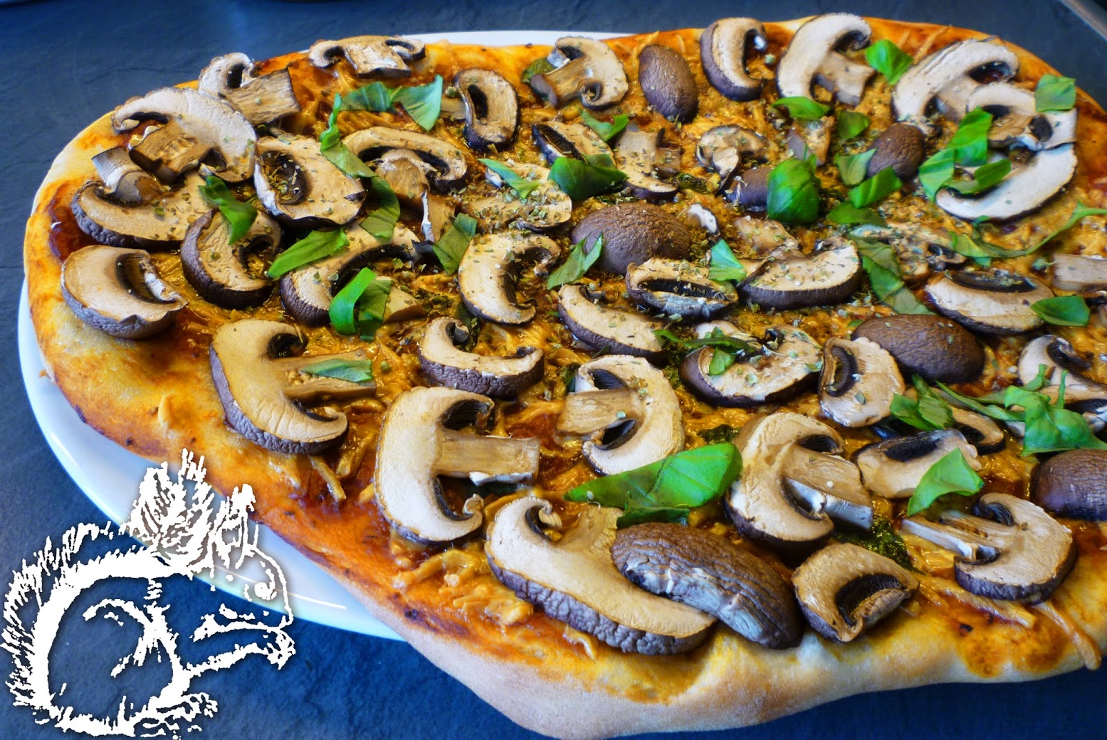 Squirrel of Nom's Tasty Treats Homemade Pizza Homemade Sauce and Dough!