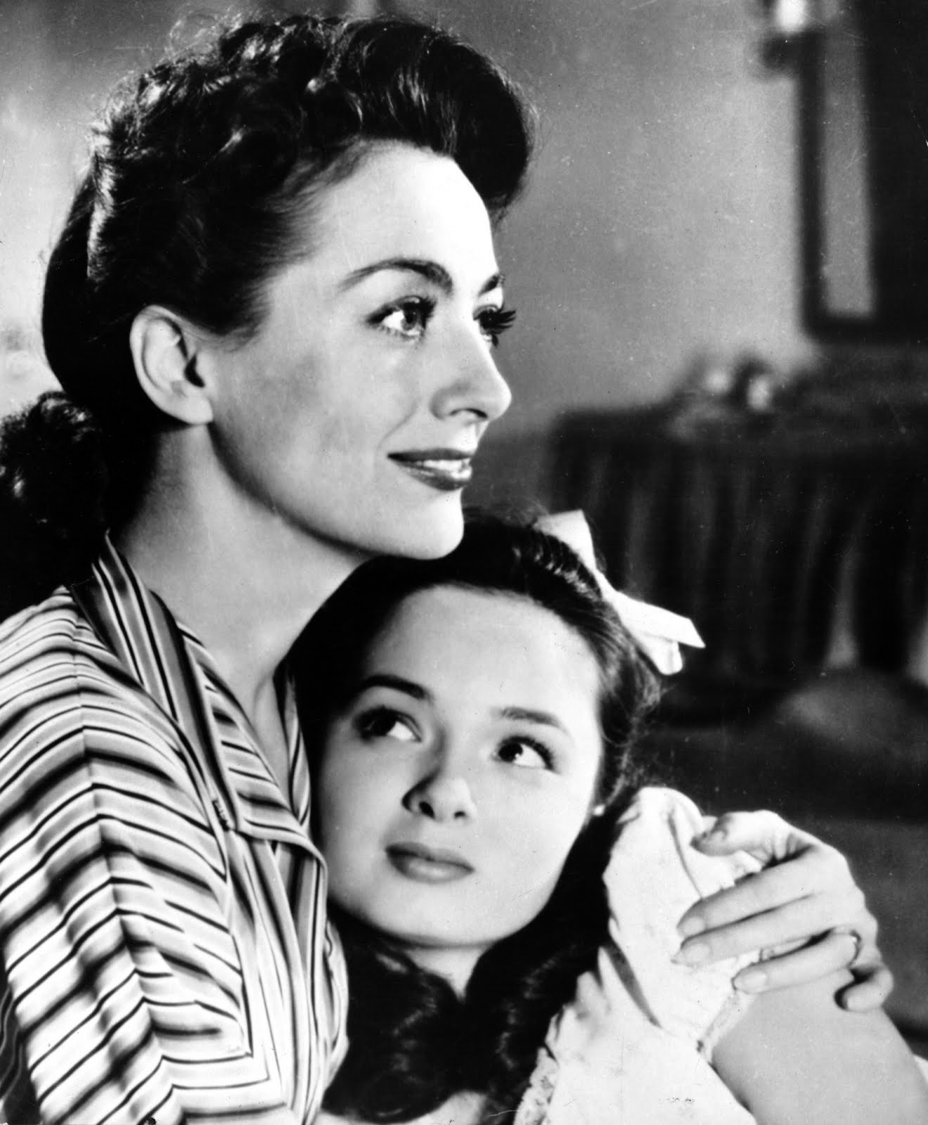 Noir and Chick Flicks Motherhood + Noir = Mildred Pierce (1948).