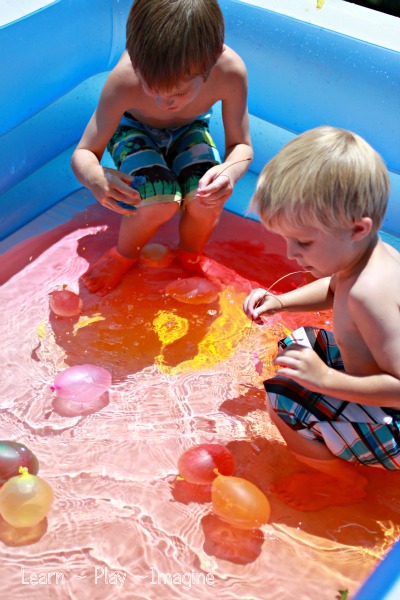 Color mixing in the play pool - combining science and summer fun!