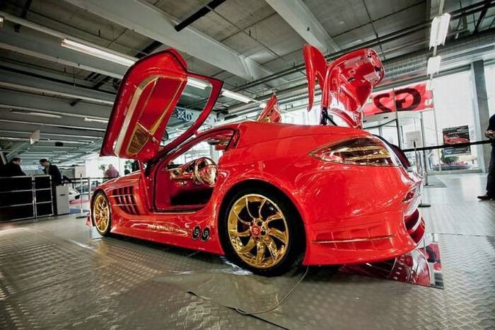 http://www.funmag.org/pictures-mag/automobile-mag/red-gold-mercedes-benz-slr-mclaren-19-photos/
