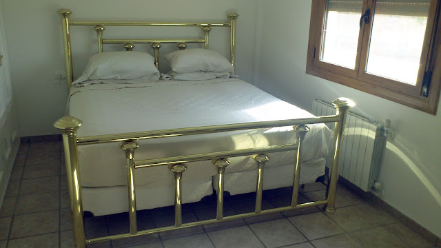 Very much work in progress but this is the HUGE American king size bed I inherited with Stuart! :)