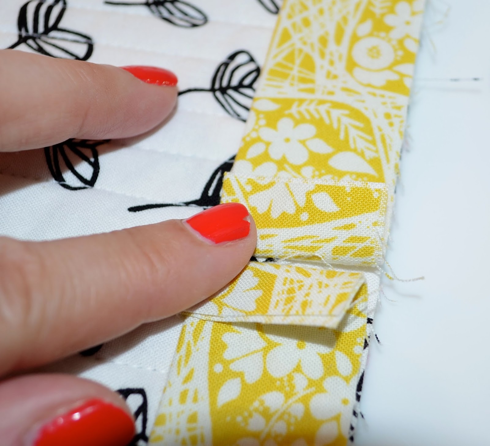 she can quilt Quilt Binding Tutorial hand and machine stitched