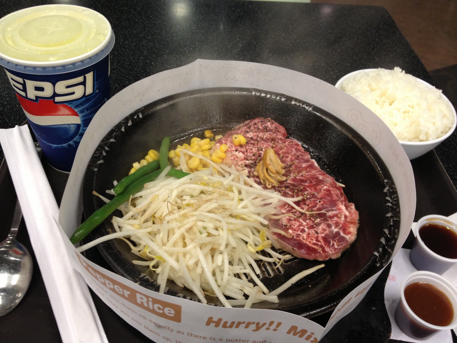 Pepper Steak served with beansprouts, sweetcorn, green beans and an