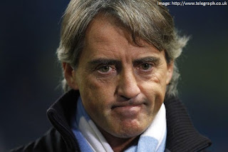 Manchester City unlucky manager Roberto Mancini
