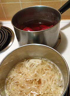 Pot of Onions & pickling juice boiling, near pot of beets cooling