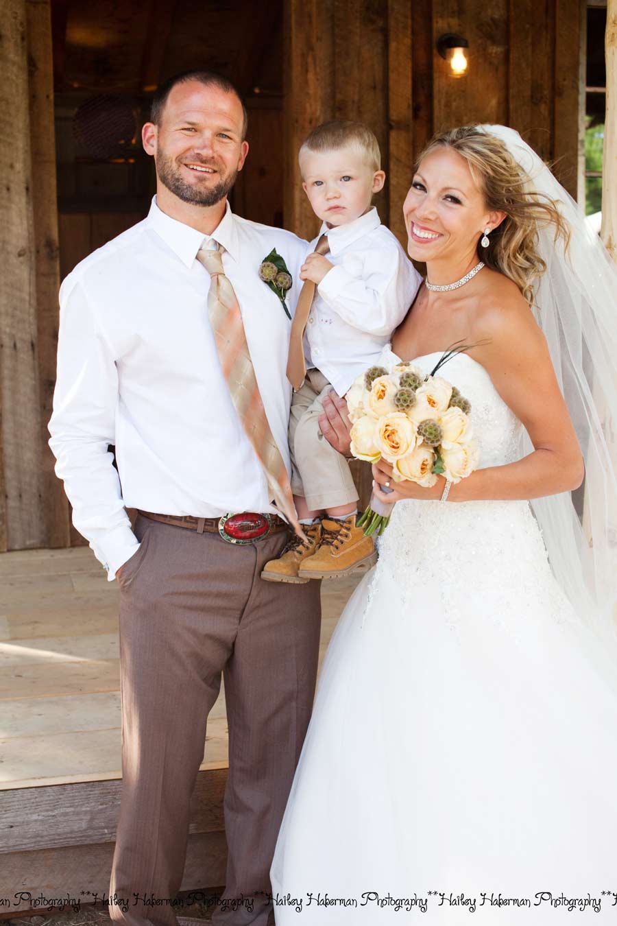 Cle Elum Backyard Wedding | Jeff and Elisia | Wedding Photo of couple with child