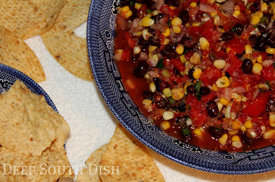 Salsa made with fresh off the cob corn and summer garden tomatoes, black beans, lime and cilantro. Just add some chips.