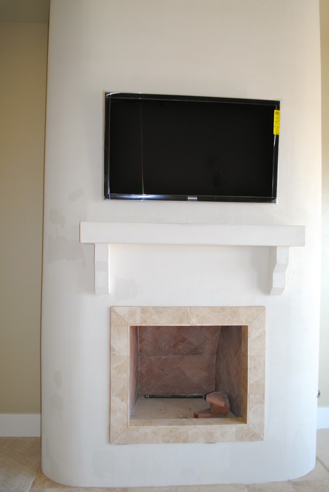 Trinity Classic Homes Stucco Fireplace