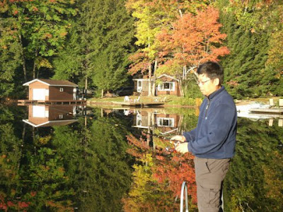 Me fishing with fall colours Lake Muskoka Thanksgiving 2011 by garden muses: a Toronto gardening blog