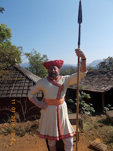 Impersonating a guard in the model "Shivkalin Khedagaon" village.