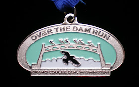 the 2008 Over the Damn Run half marathon medal