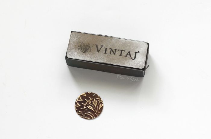 Make an embossed metal design shine using the Vintaj Metal Reliefing Block. |AD| www.pitterandglink.com