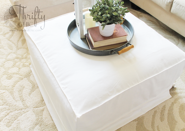 How to make a slipcover for an ottoman or coffee table. Great way to get that cute Ikea slipcover look!