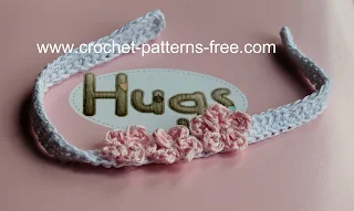lacy crochet baby headband with crochet flower