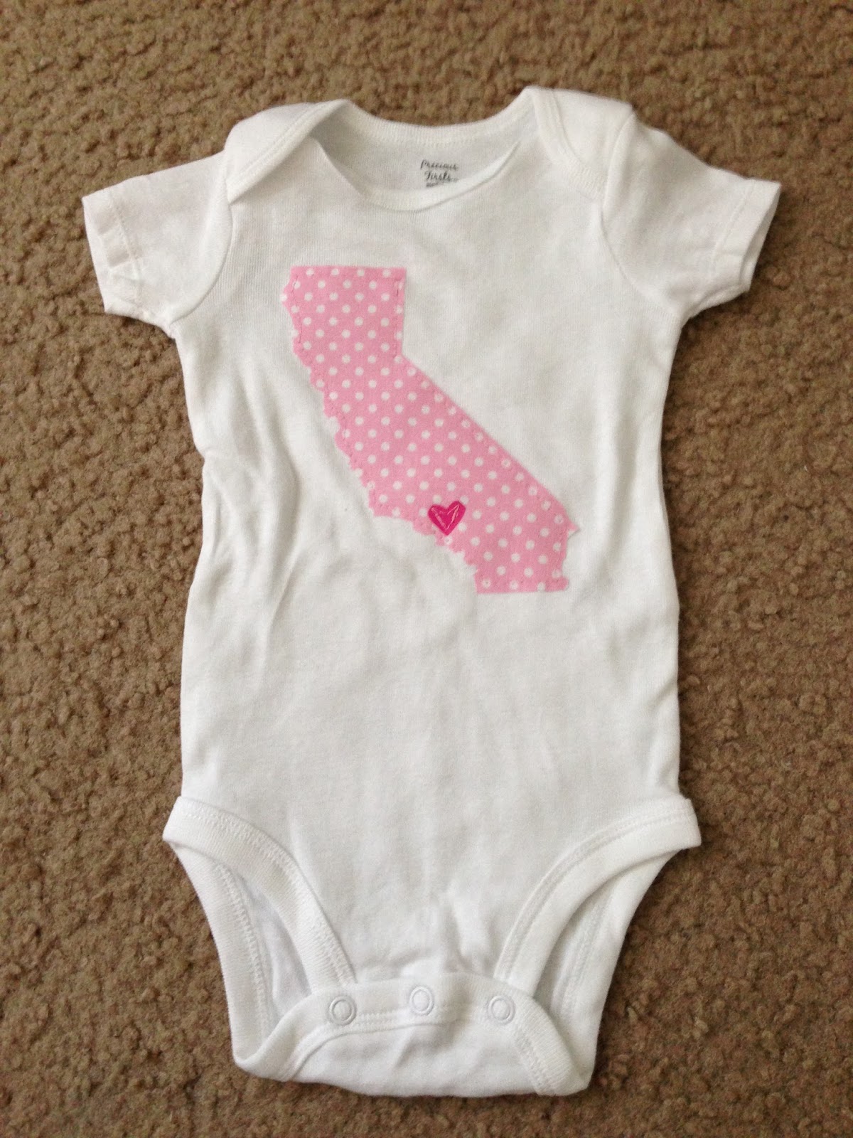 oh.. katy made it! Silhouette and appliquéd onesies