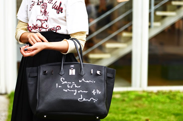 Miss Lluviaconsol: A Hermés Birkin bag with graffiti/writing on it