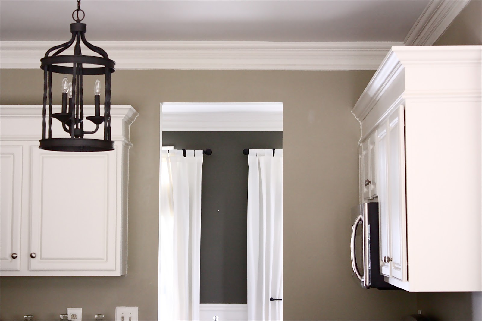 The Yellow Cape Cod Making Taller {Builder Go Custom With Molding}