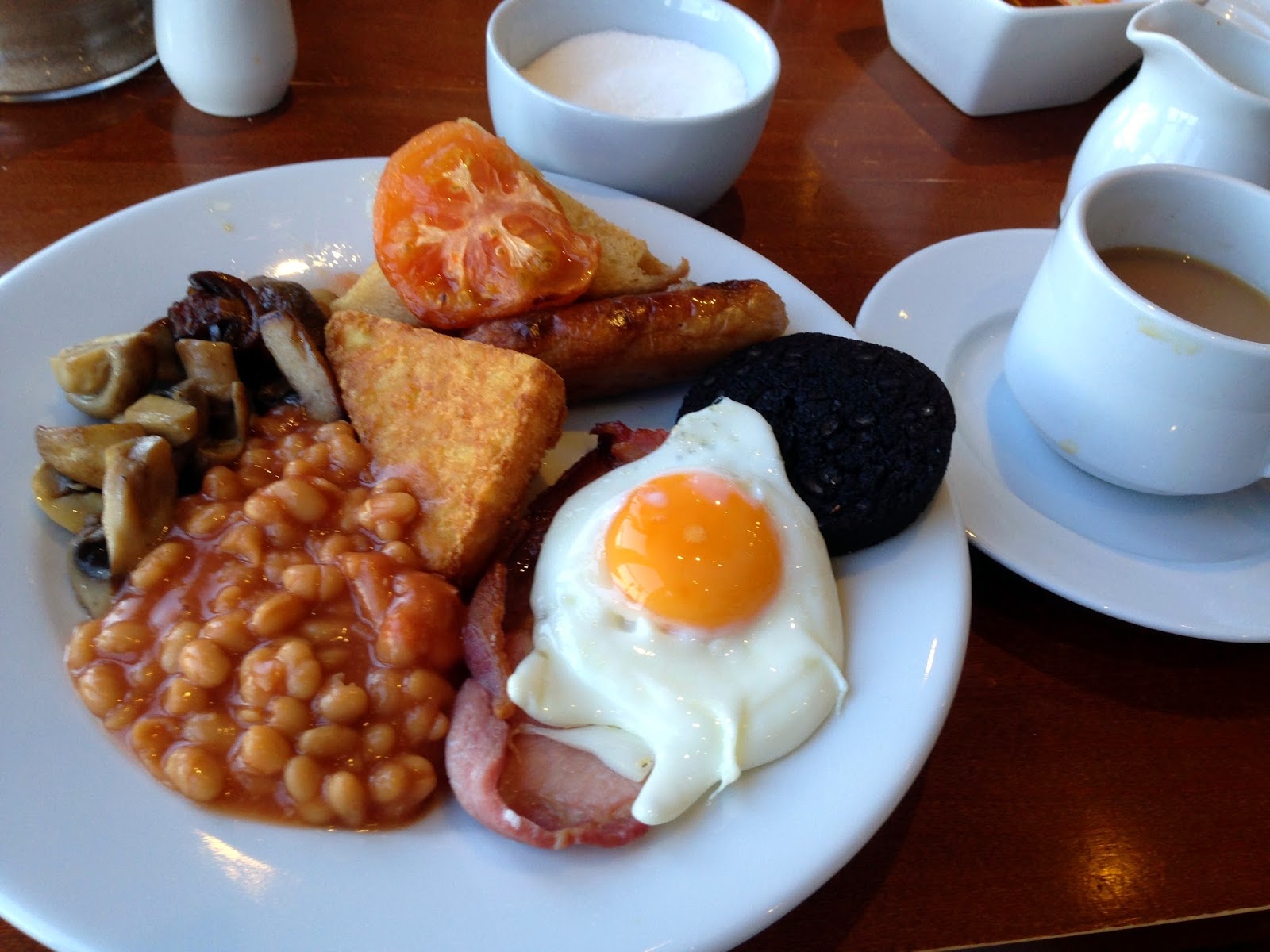Fried Breakfast, English Breakfast, Full Monty, eggs, bacon, sausage, black pudding, hash brown, mushrooms, tomato, beans, hot tea, toast and marmalade