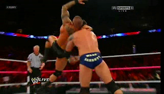 Randy orton gives an RKO to Wade Barrett at WWE raw held on 29/10/2012