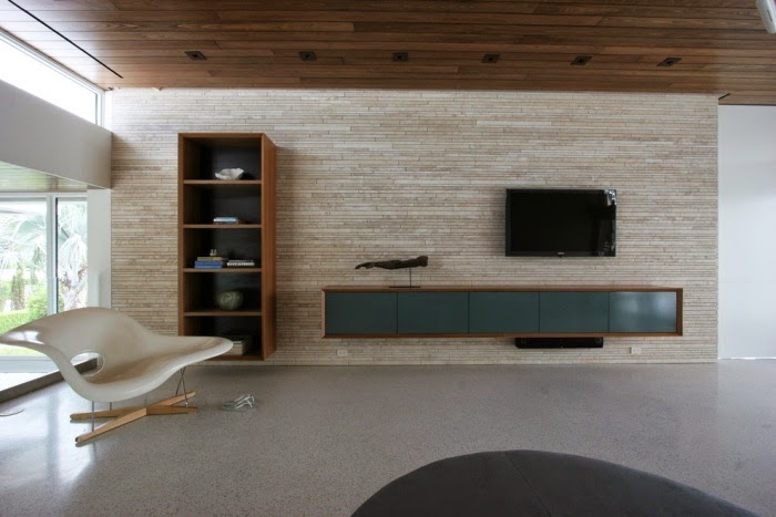 combine warm wood tones with wall units for living room