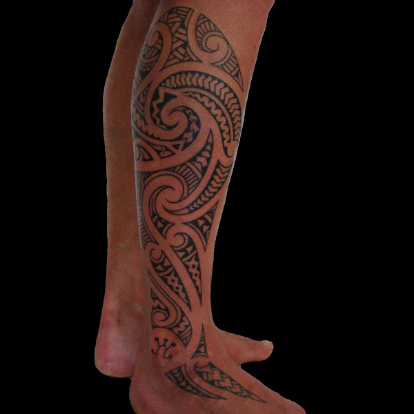 maori influenced leg tattoo