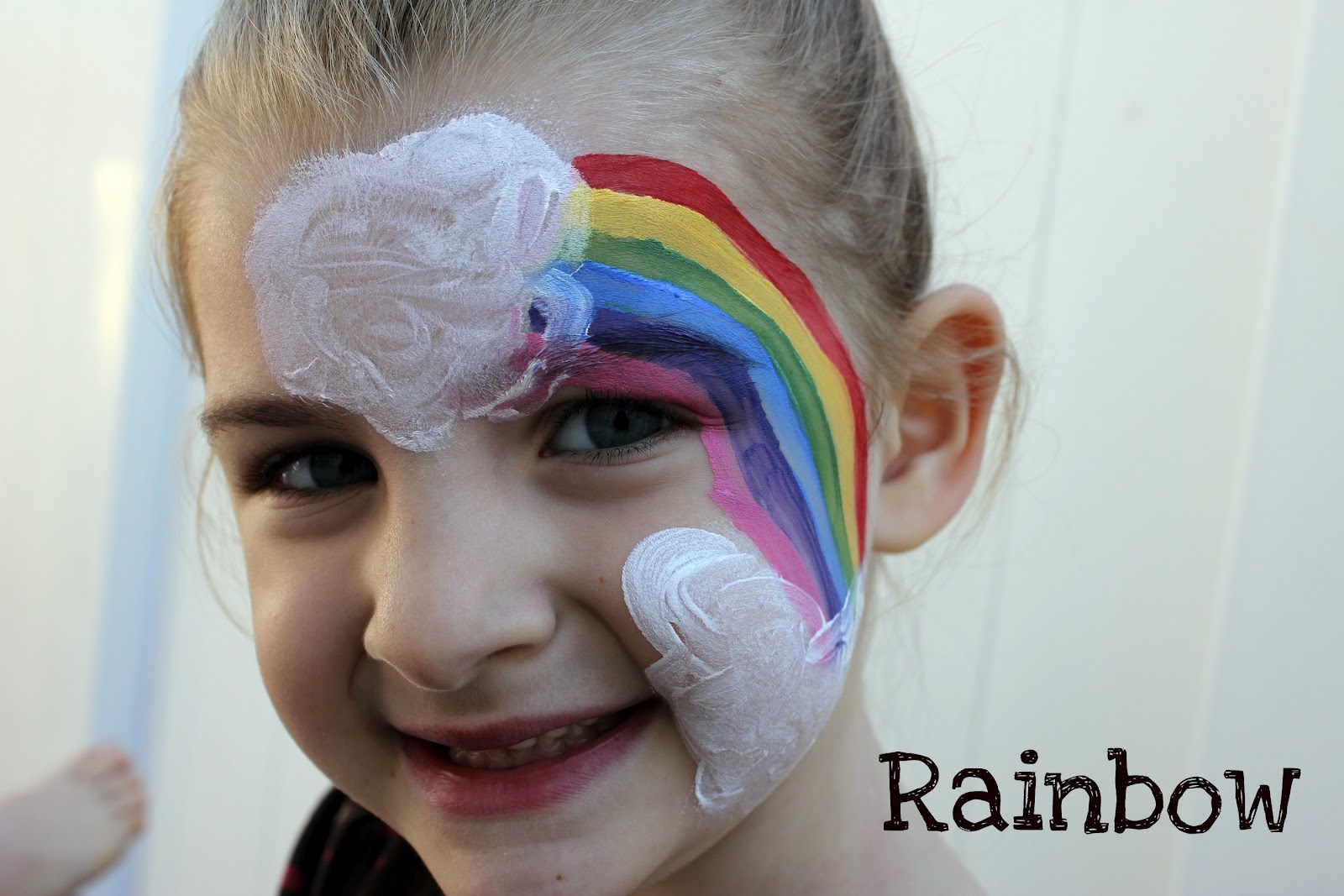 Lu Bird Baby Face painting and an easter egg hunt