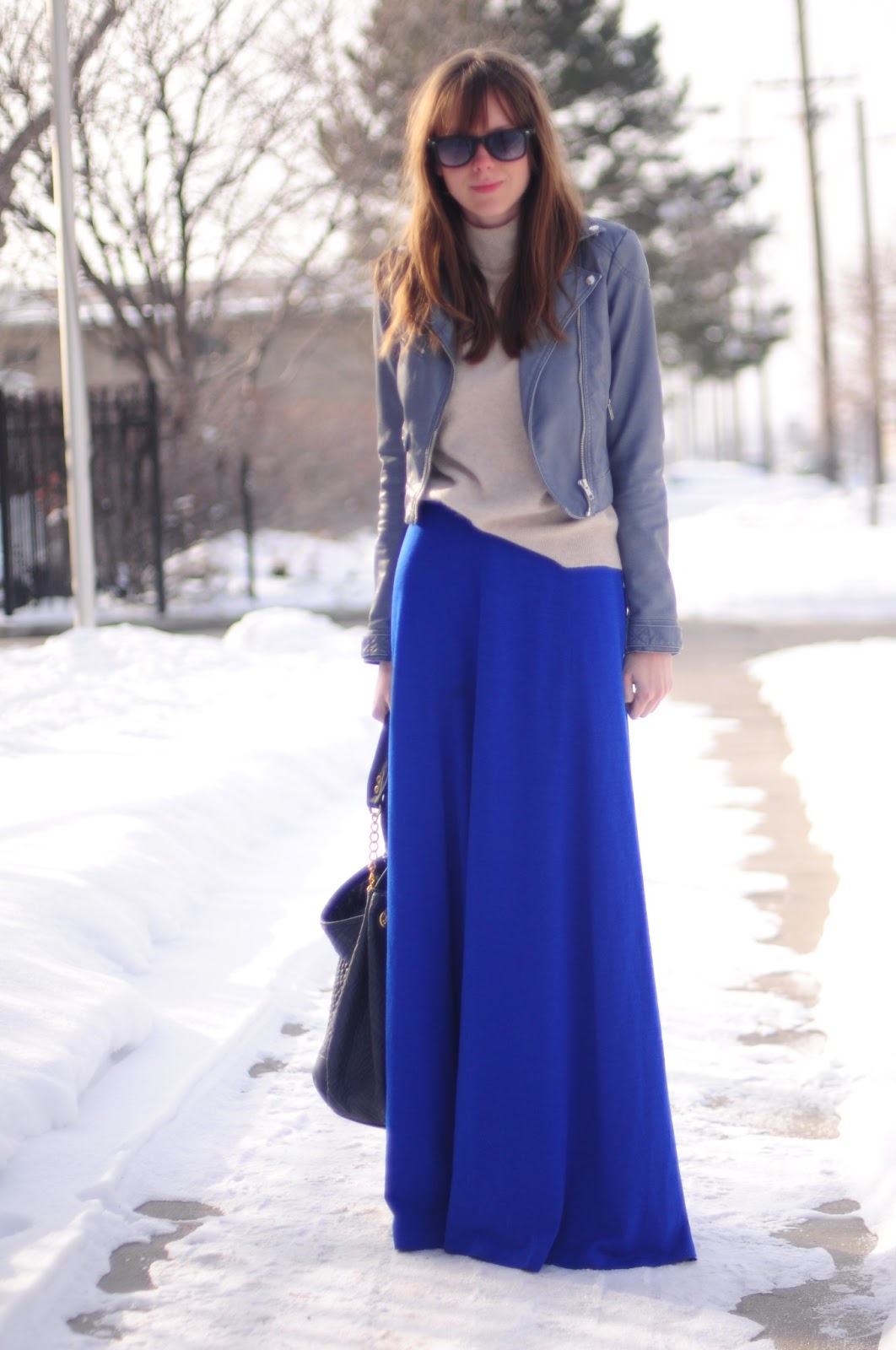 Motorcycle jacket and blue maxi skirt