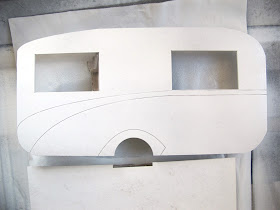 Dolls' house miniature retro caravan kit side piece, drying after being undercoated.