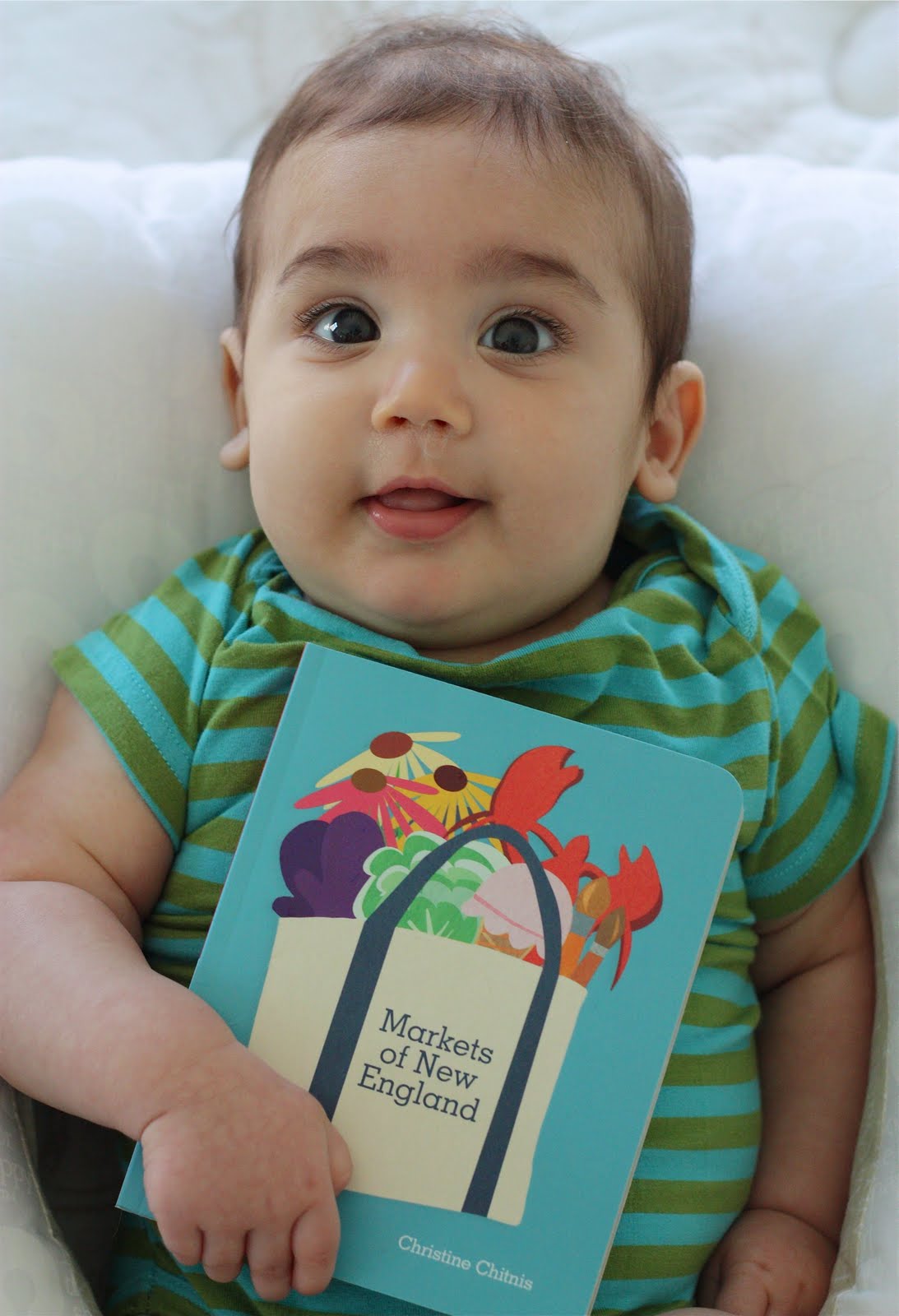 Baby Holding Book