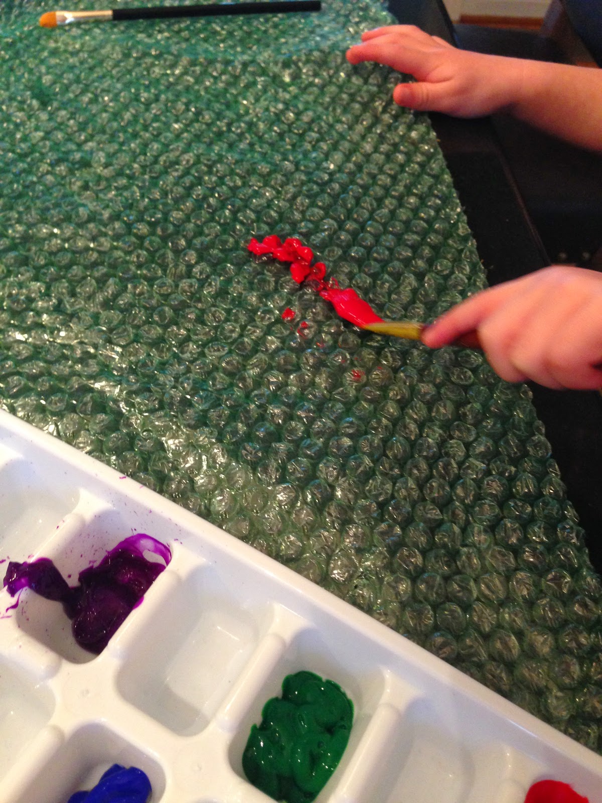 Busy and the Beans Painting on Bubble Wrap