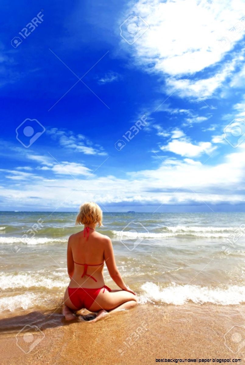 Young Woman On The Beach Looking At Horizon Stock Photo Picture Young Woman On The Beach Looking At Horizon Stock Photo Picture