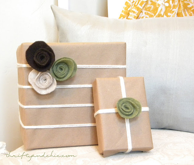 neutrally wrapped presents with kraft paper and yarn