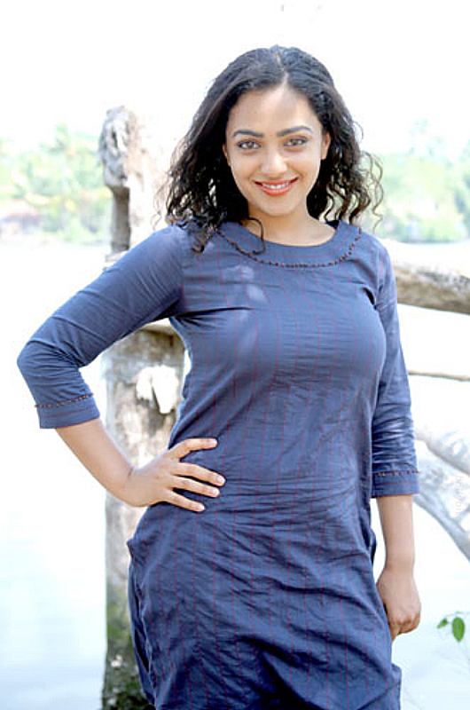 Nithya Menon New Hot Photo Shoot | Jhakkaz
