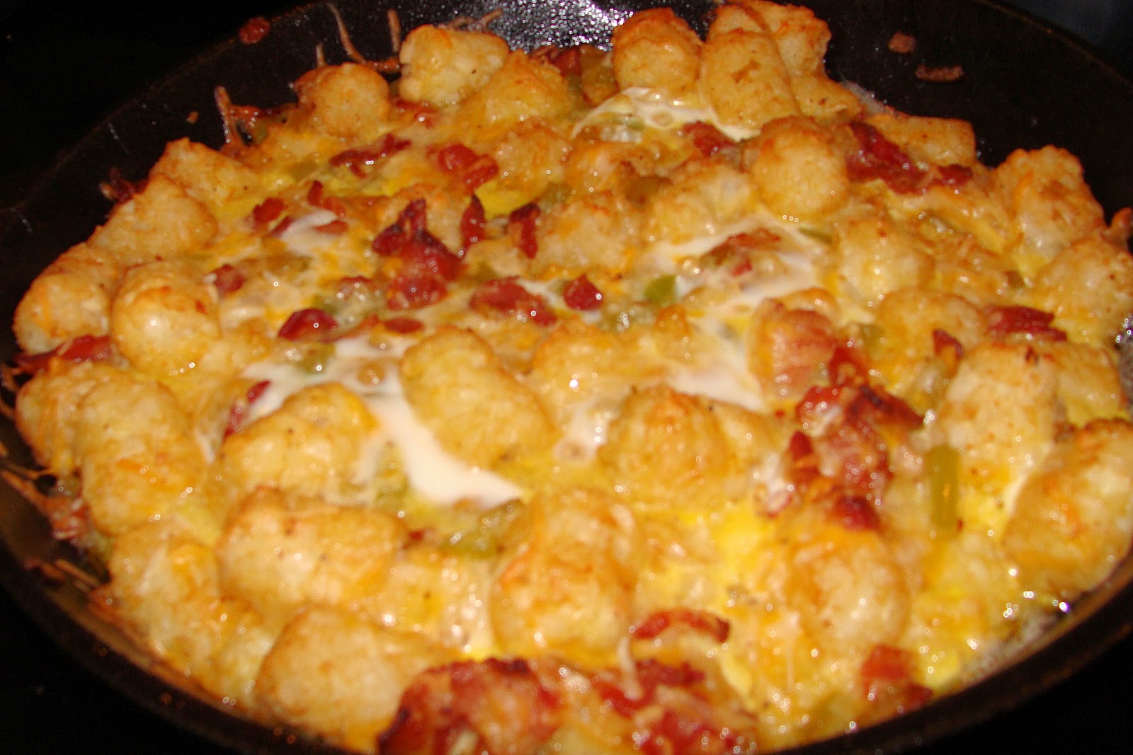 Iron Pot Cooking Bacon, Egg, and Tater Tot Casserole