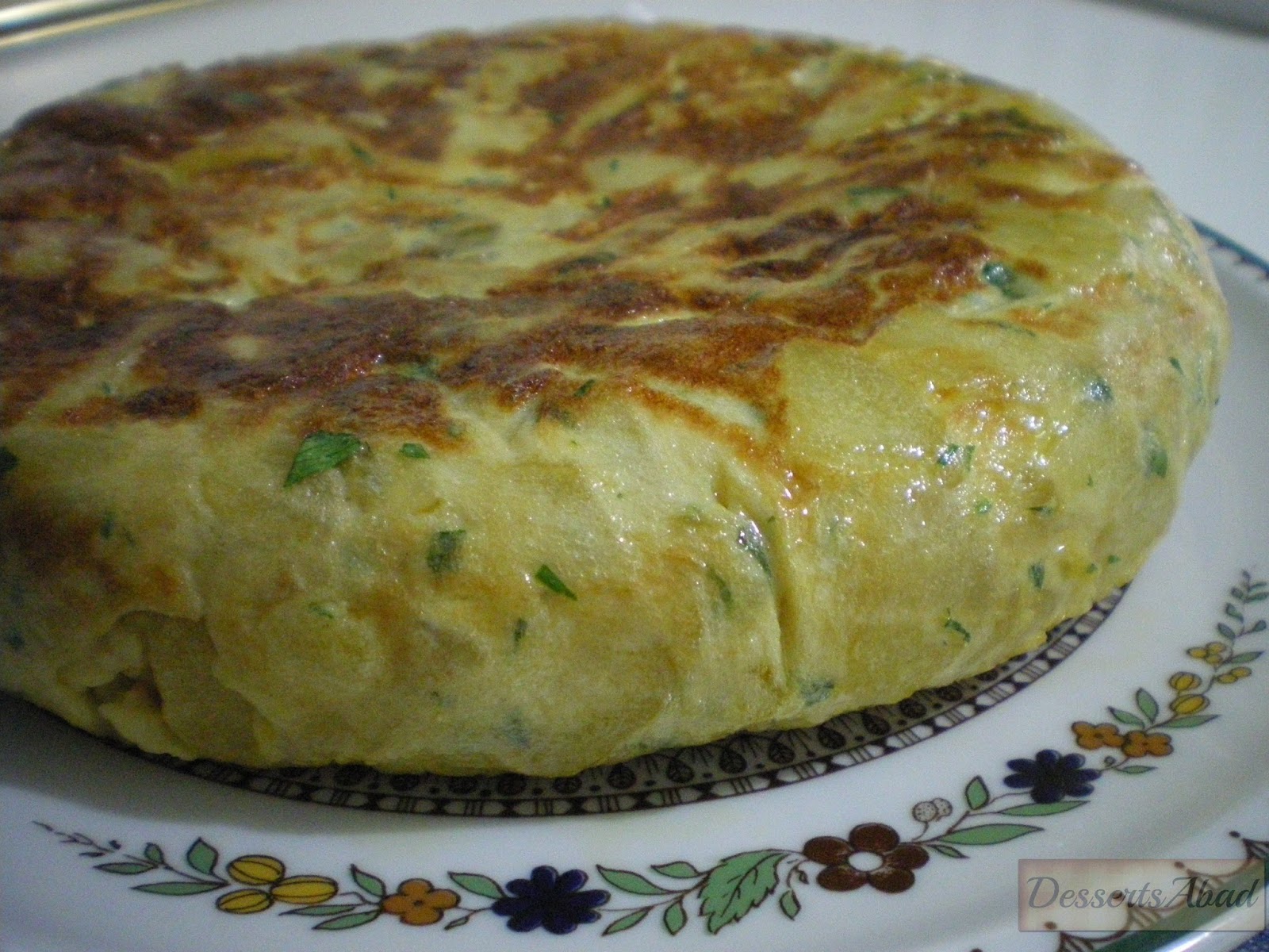 Tortilla De Patatas Con Cebollas Y Pimientos
