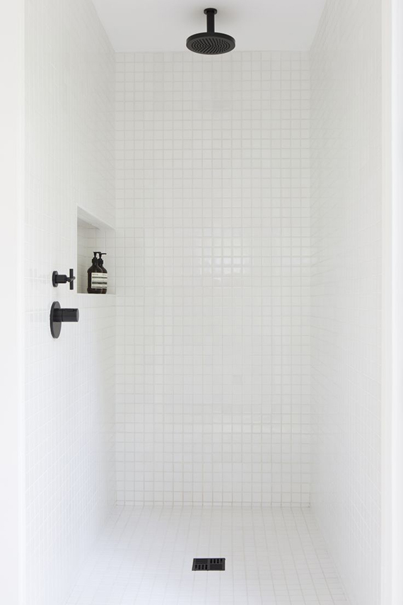 Black fixtures in the bathroom | Minimalistic shower in the Red Dirt RD House, design by Amee Allsop, photo by Glen Allsop.