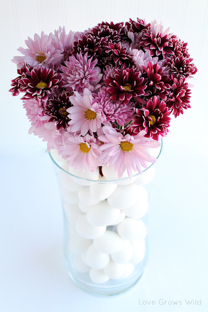 Stacked Egg Floral Arrangement by Love Grows Wild www.lovegrowswild.com #flowers #decor #spring