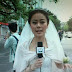 Chinese Reporter Abandons Wedding  to Report on China Earthquake in Wedding Dress!