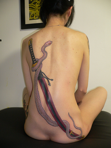 Can be explained by a large number of different snake tattoo designs and 