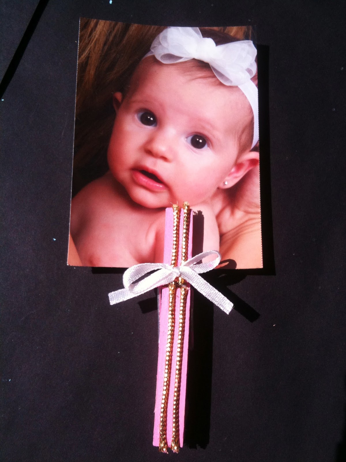 Or how about you use them to make a clothesline of baby garments for