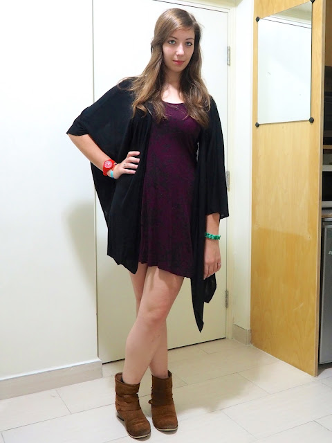 Fly Away | outfit of short dark purple floral dress, with loose black cape cardigan and brown suede ankle boots