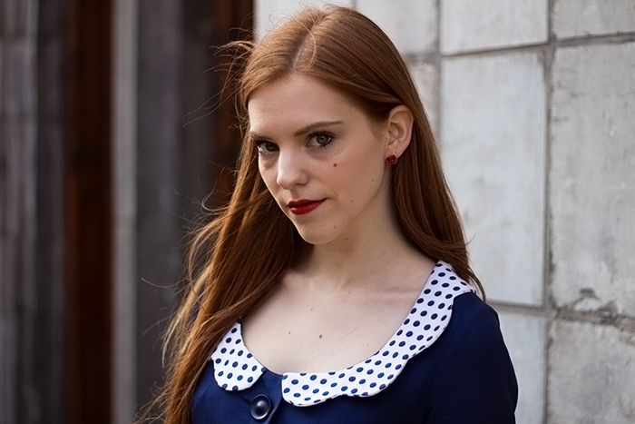 Retro fashion blogger outfit with a vintage Mary Poppins coat worn as a dress