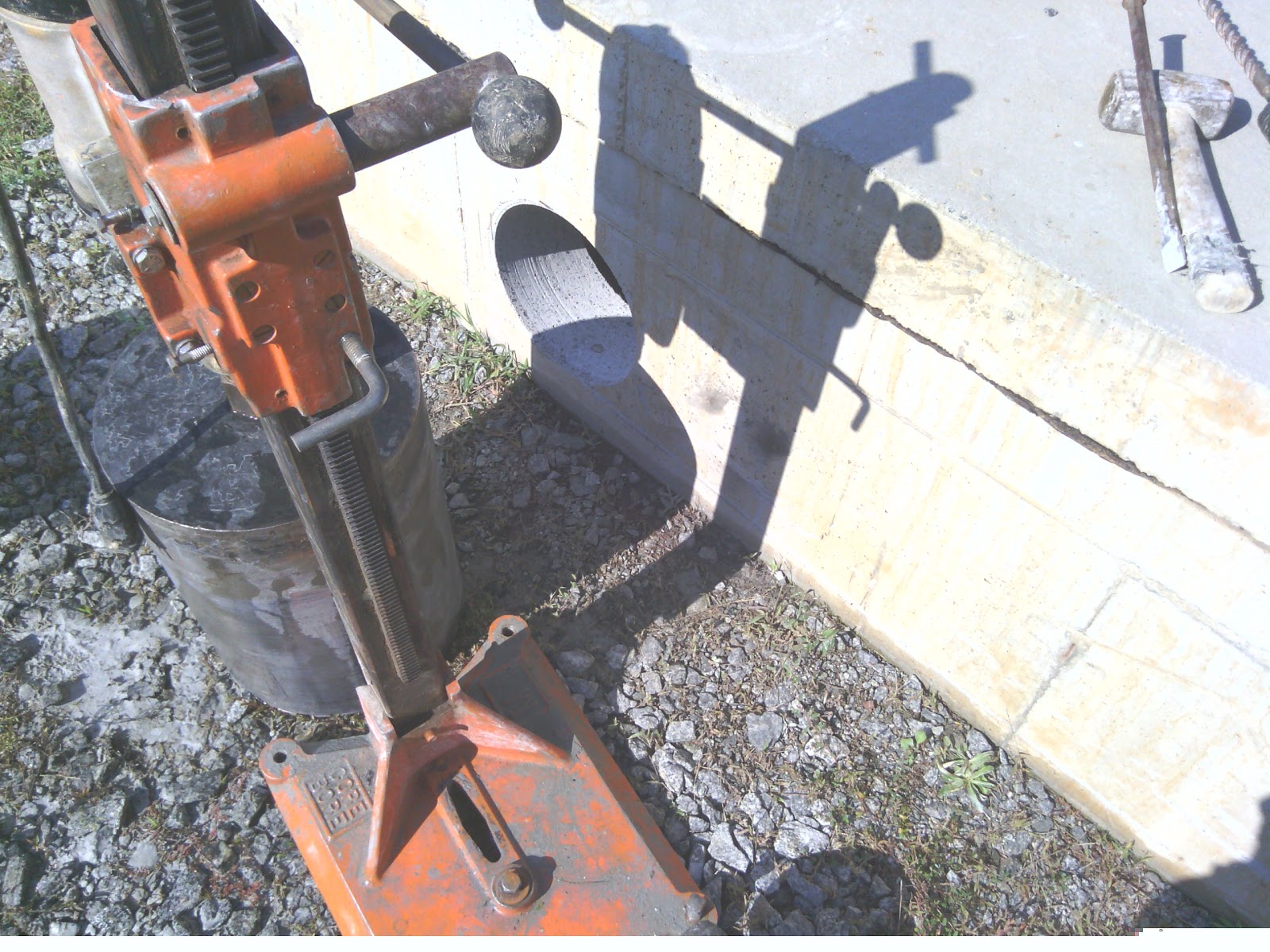 Cutting holes in concrete Cutting holes in reinforced concrete walls