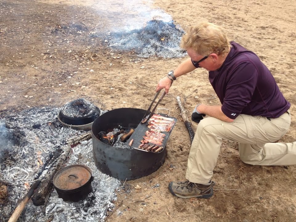 Tiny Yellow Teardrop Dutch Oven Burn Party
